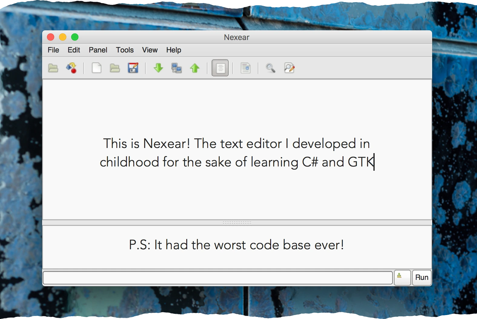 A screenshot of my GTK# based text editor 'Nexear', one panel of it is open with a text centered horizontally and vertically with the text: 'This is Nexear! The text editor I developed in childhood for the sake of learning C# and GTK', another panel is open in the bottom reading: 'P.S: it had the worst code base ever!'